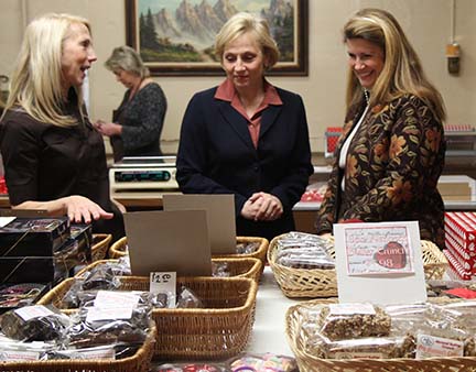 Old Monmouth Candies owner Susan Gunther explains the candy business to NJ Lt. Gov. Kim Guadagno and Freeholder Deputy Director Serena DiMaso. 
